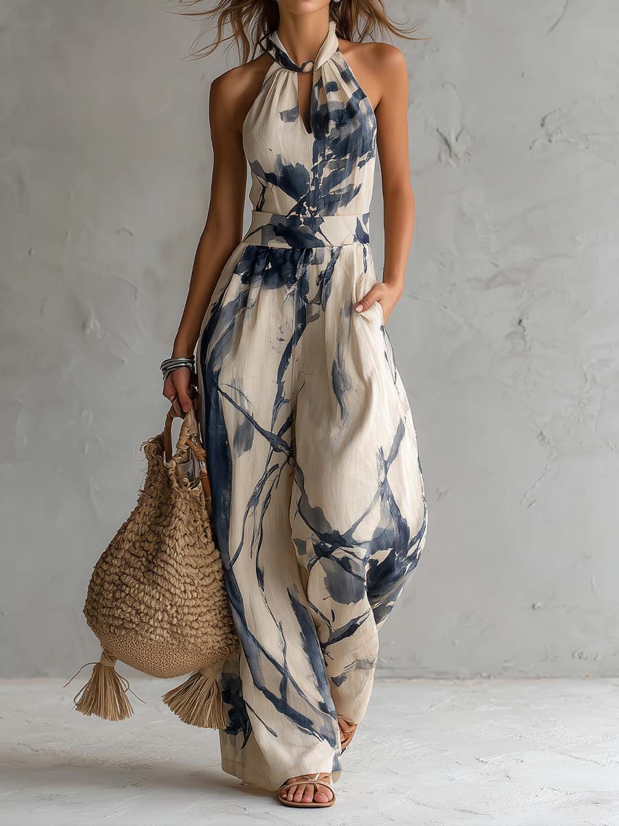 Mono con escote halter, estampado tinta china y pantalón ancho con bolsillos