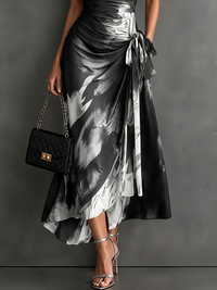 Rosalia | Vestido midi cruzado con estampado abstracto, escote en V, manga corta, cinturón y bajo asimétrico con volante
