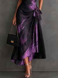 Rosalia | Vestido midi cruzado con estampado abstracto, escote en V, manga corta, cinturón y bajo asimétrico con volante