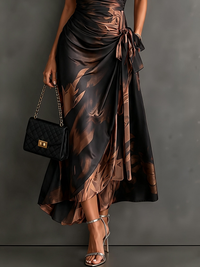 Rosalia | Vestido midi cruzado con estampado abstracto, escote en V, manga corta, cinturón y bajo asimétrico con volante