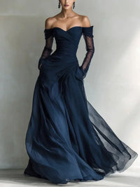 Eleonora | Vestido largo con hombros descubiertos e inserciones de malla