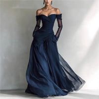 Eleonora | Vestido largo con hombros descubiertos e inserciones de malla