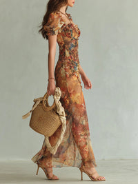 Vestido maxi naranja de chifón con estampado bohemio tipo óleo sobre lienzo
