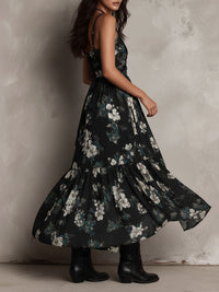 Vestido maxi negro sin tirantes de largo irregular con estampado floral bohemio