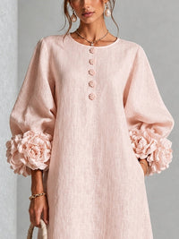 Eglantina | Vestido midi floral rosa con botones y mangas con detalle
