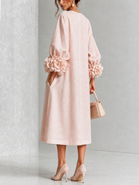 Eglantina | Vestido midi floral rosa con botones y mangas con detalle