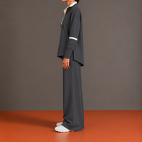 Agnese | Conjunto con Media Cremallera, Bajo Asimétrico y Pantalón Palazzo
